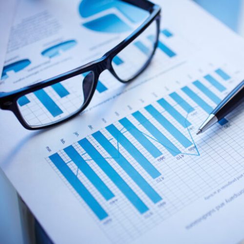 Financial report Image of eyeglasses, pen and financial document